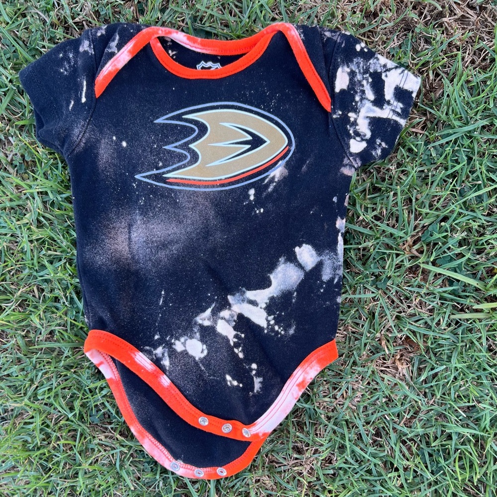 Black and orange tie-dye Anaheim Ducks baby onesie size 12M